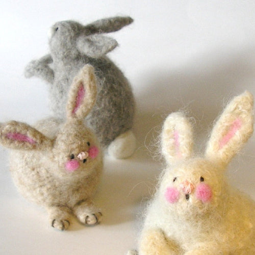 Woolly Bunnies pattern revision to include new feet on the laying down bunny.