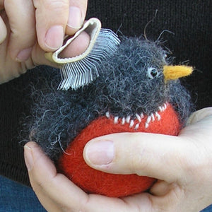 woolly bird being brushed with a nap riser